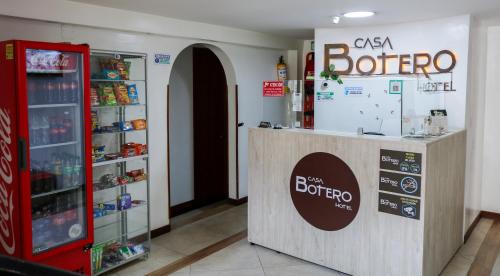 a store with a botaota sign on a counter in a store at Hotel Casa Botero 301 in Bogotá