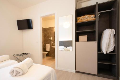 Postel nebo postele na pokoji v ubytování Hotel dell'Angelo