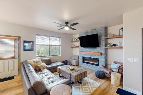 a living room with a couch and a fireplace at Ridgetop Retreat - Unit A9 in Show Low