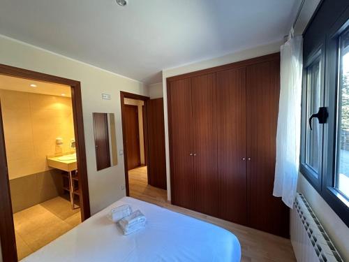 Кровать или кровати в номере Apartament La Solana del Tarter 5p - El Tarter - Zona Grandvalira