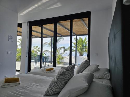 Voodi või voodid majutusasutuse Monina Bungalow toas