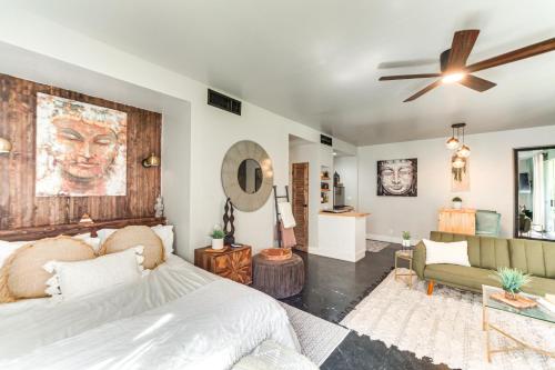 a bedroom with a bed and a living room at Near Golf Indian Wells Studio with Pool Access in Indian Wells