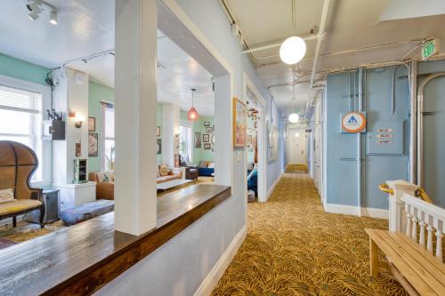 a hallway in a building with blue walls at HI San Francisco Downtown Hostel in San Francisco