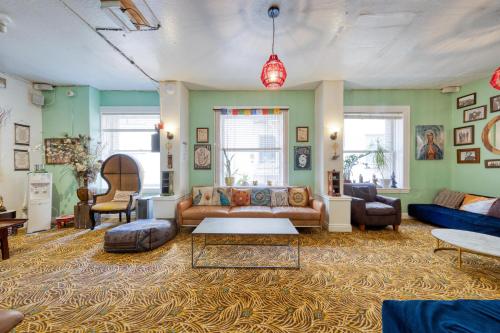 a living room with a couch and a table at HI San Francisco Downtown Hostel in San Francisco