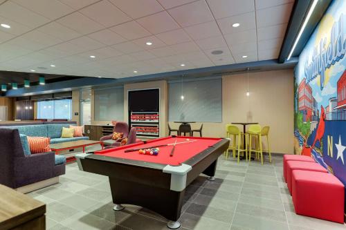 a billiard room with a red pool table at Tru By Hilton Smithfield I-95 in Smithfield