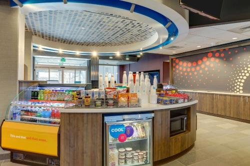 a food counter in a store with a refrigerator at Tru By Hilton Smithfield I-95 in Smithfield