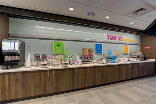 a top it counter in a store with food at Tru By Hilton Smithfield I-95 in Smithfield