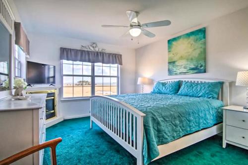 a bedroom with a bed and a ceiling fan at Bethany Bay - 37434 Pettinaro Dr #4805 in Ocean View