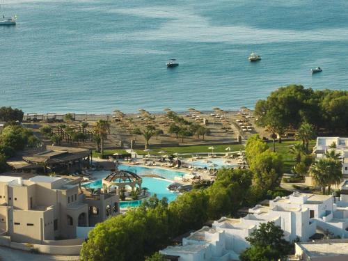 an aerial view of the resort and the ocean at Lindian Village Beach Resort, Curio Collection By Hilton in Kiotari