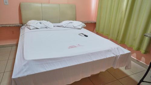 Hotel Goiânia Executiveにあるベッド