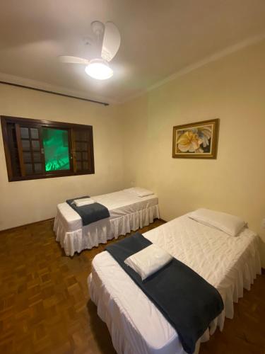 Katil atau katil-katil dalam bilik di HOTEL SOARES CAMARGO