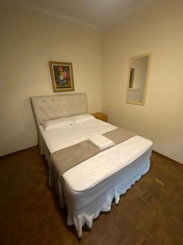 Katil atau katil-katil dalam bilik di HOTEL SOARES CAMARGO