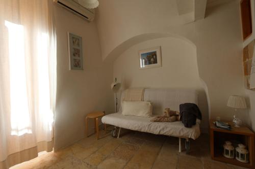 Un ou plusieurs lits dans un hébergement de l'établissement La Casetta di Babbo