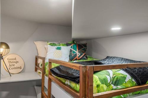 a bunk bed in a small room with at Dome House YYC, Iconic, Luxury, Backyard Oasis in Calgary