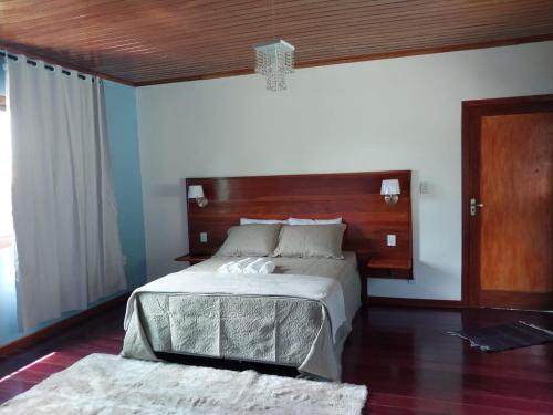 Postel nebo postele na pokoji v ubytování Vila do Vento