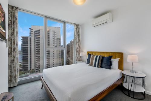 Katil atau katil-katil dalam bilik di The Sebel Residences Melbourne Docklands Serviced Apartments