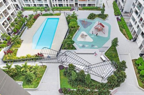 an aerial view of a swimming pool in a apartment building at SOP 99 Modern 3 Bedroom with Pool & Free Parking in Sydney