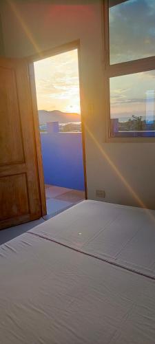 Hostal Alcazabaにあるベッド
