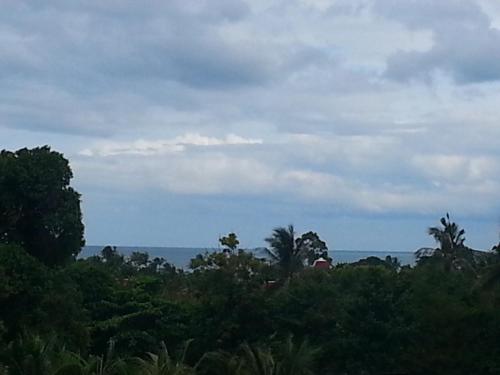 a view of a forest with trees and a sky at Rocking Chair Pool Villa in Chaweng