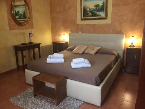 Ένα ή περισσότερα κρεβάτια σε δωμάτιο στο B&B Etna House