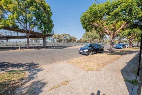 a car parked on the side of a street at Classic decor, freshly painted 3 by 2 quiet home in Corio