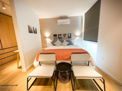 Postel nebo postele na pokoji v ubytování HOM I Apartamento con A l A en Lastarria 2PAX