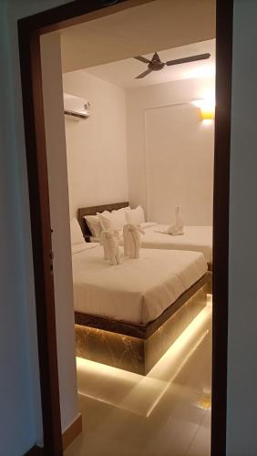 Katil atau katil-katil dalam bilik di La Shashalia Luxury