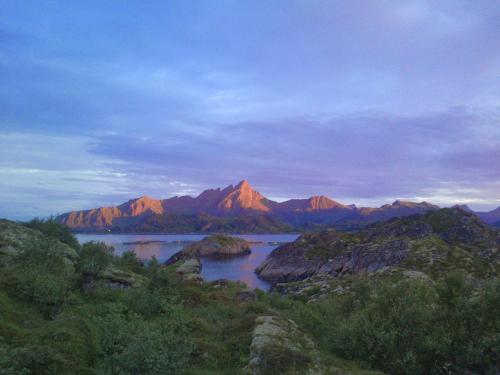 a view of a river with mountains in the background at Unique private cabin in Lofoten in Leknes