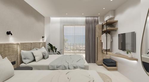 ネオス・マルマラスにあるHotel Aretiのベッドとテレビが備わるホテルルームです。