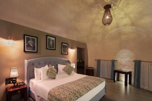 Ένα ή περισσότερα κρεβάτια σε δωμάτιο στο Dream Cliff Mountain Resort