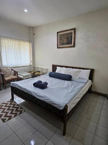 Postel nebo postele na pokoji v ubytování Nimman Rinkam Homestay