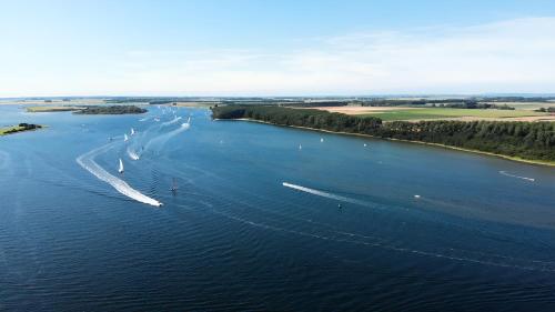 an aerial view of boats in the water at Ruime vrijstaande vakantiewoning aan Veerse meer, 6 persoons in Wolphaartsdijk
