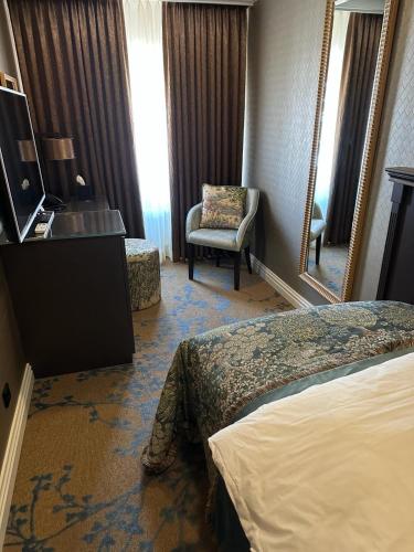 Кровать или кровати в номере Good Seasons Hotel Den Bosch