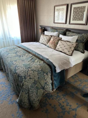 Кровать или кровати в номере Good Seasons Hotel Den Bosch
