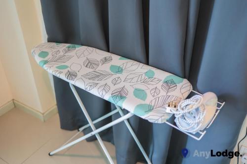 a chair with a heart pattern on it at AnyLodge Waterfront Marina Island Pangkor in Lumut