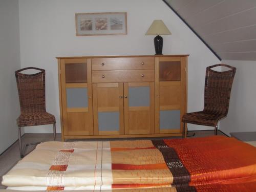Ένα ή περισσότερα κρεβάτια σε δωμάτιο στο Ferienhaus am Ternscher See