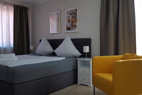 Postel nebo postele na pokoji v ubytování Hotel Milano