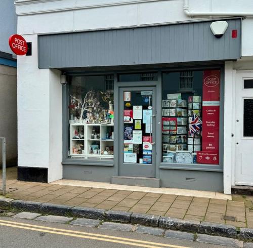 a store front of a store on the side of the street at Historic 'Old Toll House' Shaldon Bridge in Teignmouth