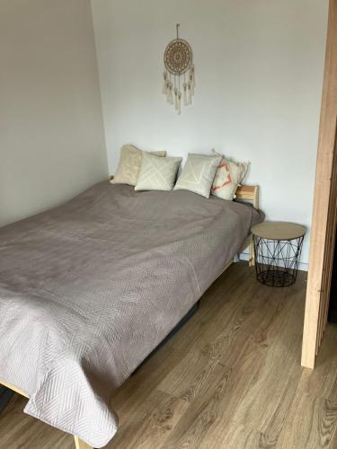 A bed or beds in a room at Soul Apartment in the center of Szczecin