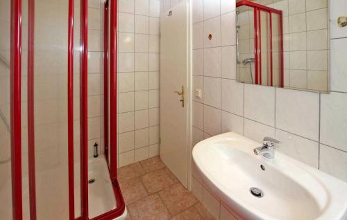 a bathroom with a sink and a shower at Beautiful Apartment In Torgelow With Wifi in Torgelow