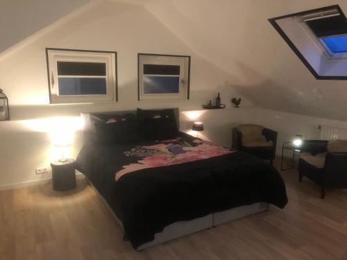 Ένα ή περισσότερα κρεβάτια σε δωμάτιο στο B&B Marialin