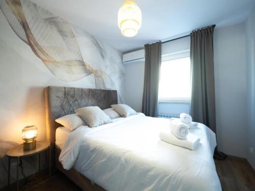 Katil atau katil-katil dalam bilik di ML Apartment-2Bedroom free parking -Self check in