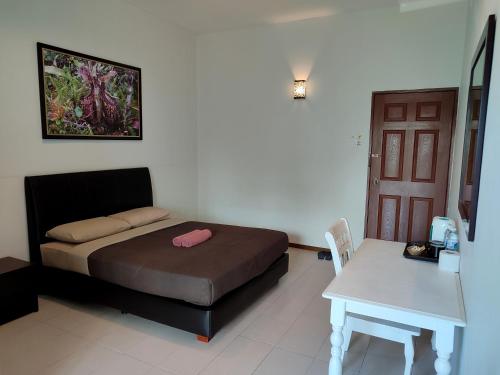 Ένα ή περισσότερα κρεβάτια σε δωμάτιο στο Rovers Inn Guesthouse - Age 11 And Above Only