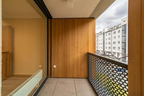 a balcony with a view of a building at Residence Mozaika in Prague