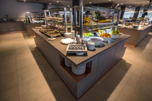 a buffet line with many different types of food at Arena Hotel Holiday in Medulin
