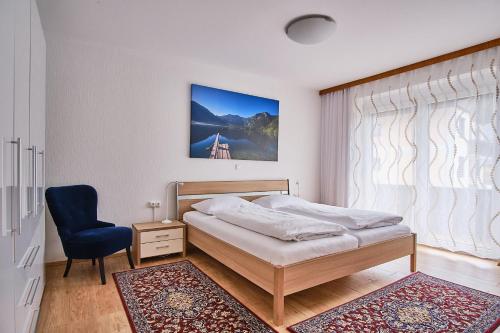 Ένα ή περισσότερα κρεβάτια σε δωμάτιο στο Appartements Das Charlie