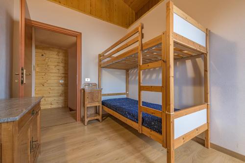 Postel nebo postele na pokoji v ubytování Albergo Diffuso Forgaria Monte Prat
