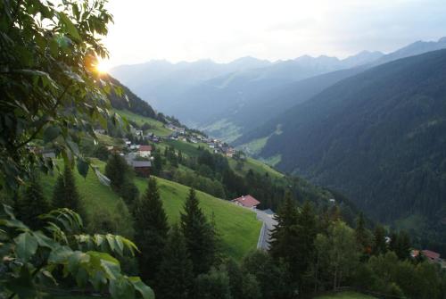 a view of a valley with mountains in the distance at Ferienhaus Nadine in Kappl