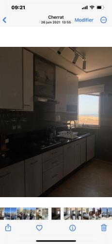 A kitchen or kitchenette at rooftop bouznika