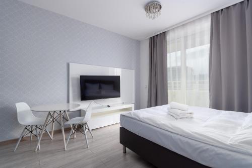 Posteľ alebo postele v izbe v ubytovaní Ovo Chic Studio